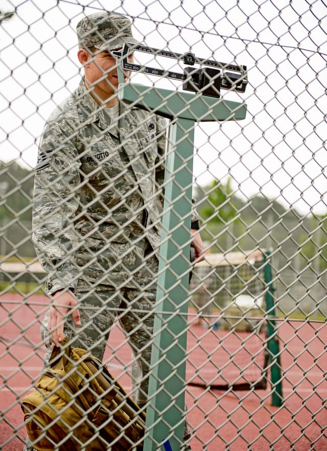 Tech. Sgt. Luis Devotto, 86th Vehicle Readiness Squadron refueling maintenance NCO in charge, weighs his rucksack May 27 on Ramstein. More than 300 participants came out to support the first-ever Chief Master Sgt. Paul Airey Memorial Ruck-Run hosted by the Ramstein Area Chiefs Group.