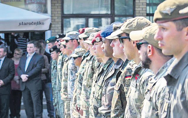 Competitors from a number of NATO nations stand in formation during a ceremony held for the Croatian Best Soldier competition May 12 in Grubisno Polje, Croatia.
