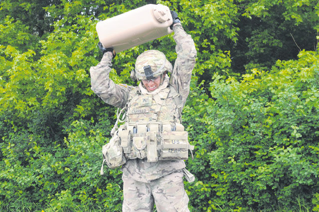 Sgt. Vanessa Carrillo, 2016 Best NCO Warrior, carries water for the 16th Sustainment Brigade during the 21st Theater Sustainment Command Best Warrior Competition May 23 on Smith Barracks. Carrillo, who serves with the Knight Brigade's 515th Transportation Company, 39th Transportation Battalion, triumphed over four other noncommissioned officers from across the command. Carrillo and candidates across the region will compete for top honors during the European Best Warrior Competition slated for Aug. 7 to 11 in Grafenwoehr.