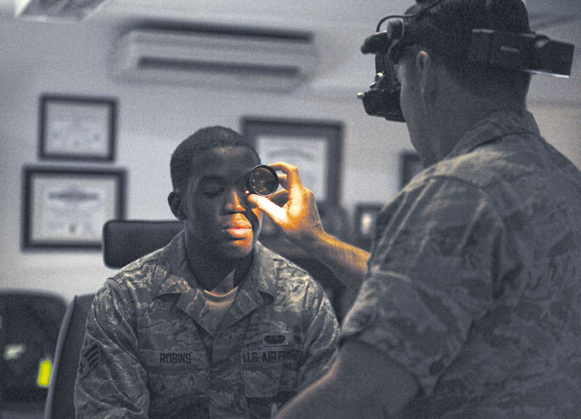 Senior Airman Jonathan Robins, 1st Combat Communications Squadron maintenance operations center technician, receives an eye exam June 23 on Ramstein. The 86th Aerospace Medicine Squadron optometry clinic works to ensure all patients receive the medical care they need to ensure the best eye health possible.