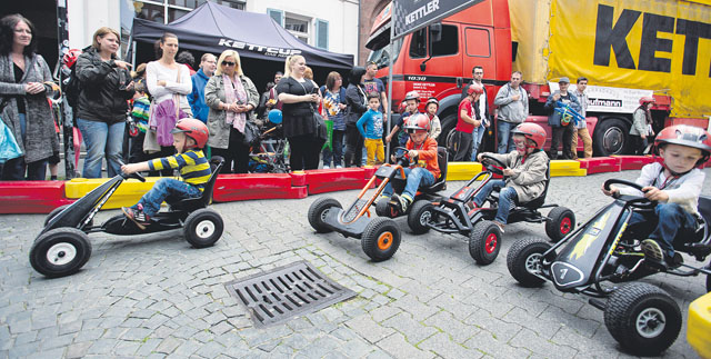 Children can test their driving skills on scooters during Kaiserslautern’ children fest Saturday.