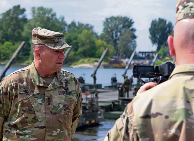 Photo by Staff Sgt. Frank Brown Jr.Lt. Gen. Ben Hodges, U.S. Army Europe commanding general, prepares for a briefing just prior to a deliberate water crossing conducted as part of exercise Anakonda 16 June 8 in Chelmno, Poland.
