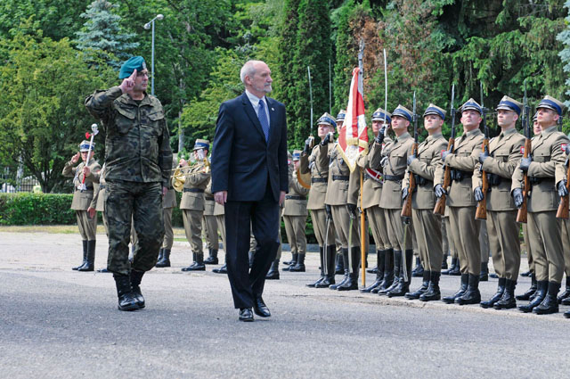 Photo by Staff Sgt. Betty BoomerAntoni Macierewicz, Polish minister of defense, and Lt. Gen. Marek Tomaszycki, Polish armed forces operational commander, review troops during the Anakonda 16 opening ceremony  June 6 at the National Defense University in Warsaw, Poland.