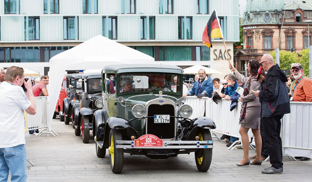 Photos courtesy of the city of KaiserslauternSpectators welcome the vehicles taking part in the Trifels Rallye, which is a part of the Kaiserslautern Classics event. Motorists are scheduled to return from a 250-kilometer tour around 5 p.m. Saturday on Stiftsplatz.