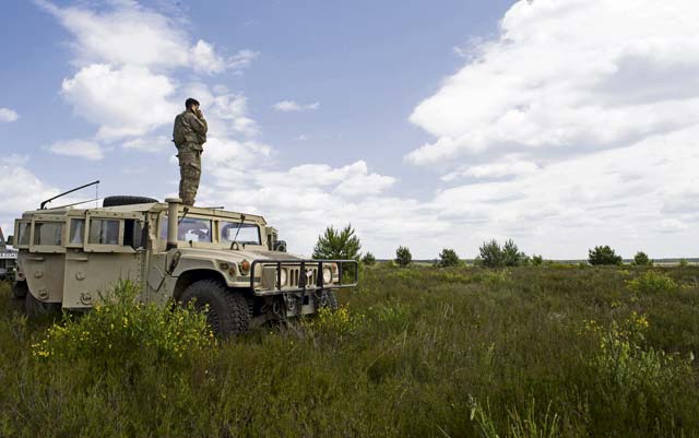 Staff Sgt. Thad Taylor, 15th Air Support Operations Squadron joint terminal attack controller, scouts the landscape as he participates in exercise Anakonda 2016 June 10 in Poland. Exercise Anakonda 2016 is a U.S.- and Polish-led exercise involving several nations, with over 25,000 participants from more than 20 countries.