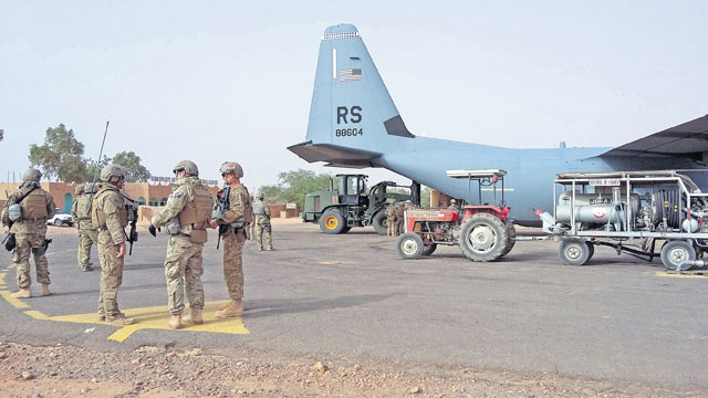 Photo by Jeffrey McGovernAirmen unload a C-130J Super Hercules during a deployment April 29 in Africa. The 435th Contingency Response Group prepared a bare base for future forces to establish a variety of missions. The mission and location added new challenges with 110-degrees-Fahrenheit summer heat.