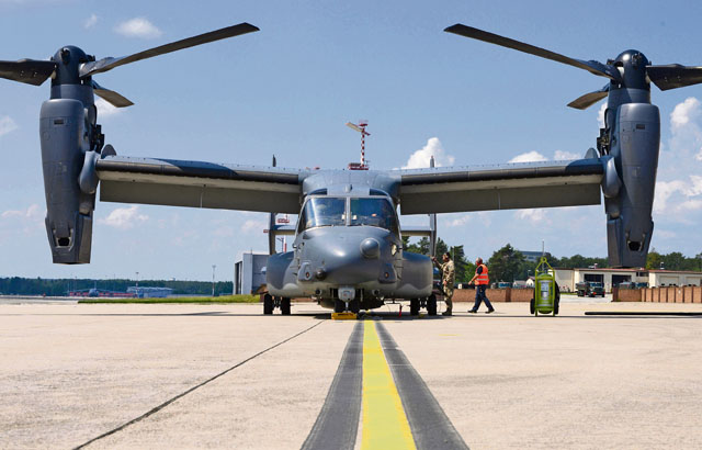 An Airman from the 7th Special Operations Squadron at Royal Air Force Mildenhall, England, prepares a CV-22 Osprey for departure June 6 on Ramstein. The CV-22 crew were returning to Mildenhall from the D-Day remembrance airdrops in Normandy, France, and stopped by Ramstein to pick up their squadron members returning from a deployment.