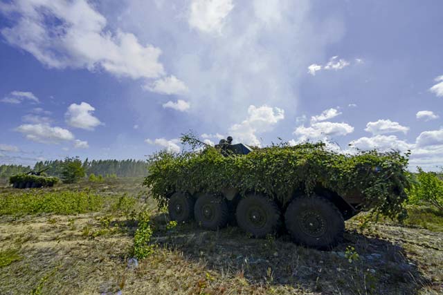 NATO forces drive tanks across a simulated battlefield during a training exercise June 13 on Adazi Military Training Base, Latvia. U.S. forces and NATO partners are in Europe participating in Saber Strike ’16, a long-standing, U.S. Joint Chiefs of Staff-directed, U.S. Army Europe-led cooperative-training exercise that has been conducted annually since 2010. Saber Strike rapidly deploys personnel across the Baltic region, ensuring allied and partnered nations are able to quickly assemble and train anywhere they are called to do so.