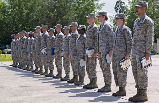 Graduates from the Air Education and Training Command’s Class 5 Basic Protocol, Honors and Ceremonies Course recite the Honor Guard Creed after receiving their diplomas June 9 on Ramstein. The graduates completed 80 hours of training in pallbearing, firing party, colors and maintenance and wear of the ceremonial uniform.