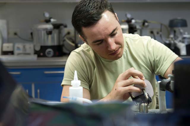 Senior Airman Dylan Lemos, 86th Dental Squadron dental lab technician, bends a wire around a mold of teeth to create a retainer June 30 on Ramstein. The dental lab is divided into two sections: the base dental lab and the area dental lab. The base dental lab provides for Ramstein, while the area dental lab provides for several bases throughout U.S. Air Forces in Europe.