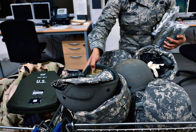 Senior Airman Cierra Dominguez, 86th Logistics Readiness Squadron individual protective equipment journeyman, puts away equipment July 15 on Ramstein. In addition to supporting the KMC, the 86 LRS armory assists partner nations Slovakia, Romania and Belgium by housing their weapons.
