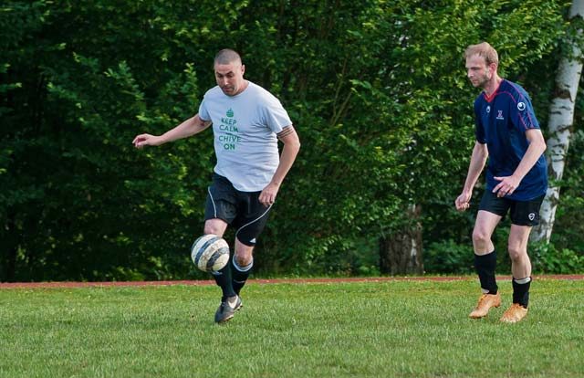 Maj. Casey Chronister, 76th Airlift Squadron C-21 instructor pilot, runs down the soccer field during the Ramstein intramural soccer finals June 29, 2016, at Ramstein Air Base, Germany. After the full season ends, all participating units compete in a tournament-style final where teams play double-elimination matches until one team is left.