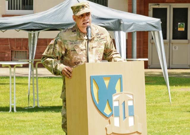 Photo by Staff Sgt. Betty Y. Boomer Command Sgt. Maj. Alberto Delgado, the incoming 21st Theater Sustainment Command senior enlisted leader, delivers remarks during his change of responsibility ceremony July 8 at Panzer Field. The New York City native, a combat-tested veteran of Operation Desert Shield/Desert Storm, Operation Iraqi Freedom, Operation New Dawn, Operation Odyssey Dawn and Operation Enduring Freedom, served most recently as the Army Material Command operations and logistics sergeant major. 