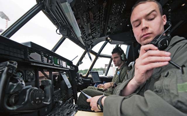 First Lt. Robert Lahr and Capt. Brian Vos, 37th Airlift Squadron pilots, prepare a C-130J Super Hercules for take off during a Joint Airborne / Air Transportability Training exercise June 30, 2016, at Ramstein Air Base. The 37th AS maintains mission readiness by integrating JA/ATT training alongside other units such as the 2nd Air Support Operations Squadron.