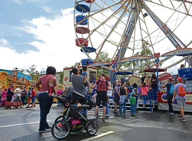Festival goers line up for a Ferris wheel ride during Freedom Fest 2016 at Ramstein Air Base.