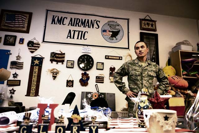 Photo by Airman 1st Class Joshua Magbanua  Senior Airman Nigel Lee, 86th Logistics Readiness Squadron traffic management office member, works at the Airman’s Attic checkout desk at Ramstein Air Base, June 24, 2016. The Airman’s Attic is sponsored by the Kaiserslautern Military Community Top 3 organization. 