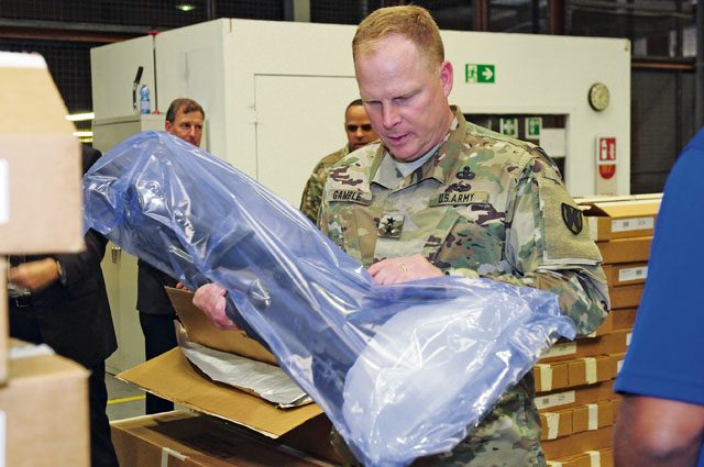 Maj. Gen. Duane Gamble, 21st Theater Sustainment Command commanding general, inspects a shipment of weapons July 27 at the Kaiserslautern Army Depot.