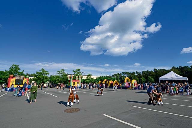 Department of Defense members and their families attend a block party Aug. 5 on Ramstein. The Ramstein Enlisted Club sponsored the event, which was open to all DOD cardholders and their families with base access.
