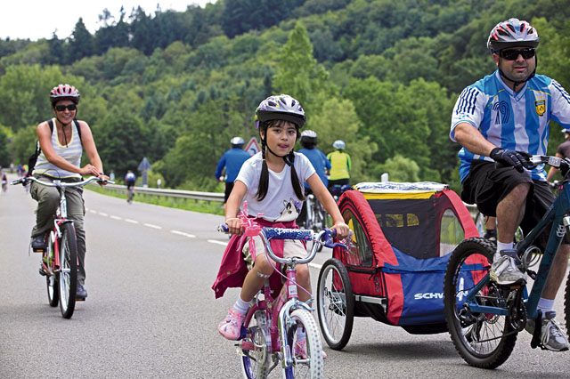 Families enjoy the car-free adventure day scheduled from 10 a.m. to 7 p.m. Sunday.