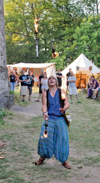 Jugglers present their skills during the medieval fest in Merzalben, which is taking place today through Sunday.