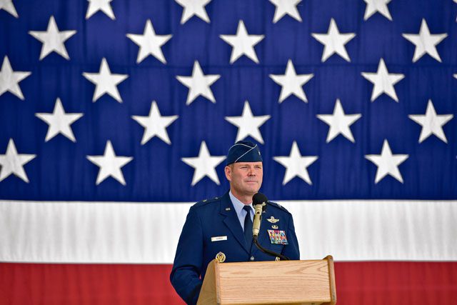 Photo by Airman 1st Class Lane T. Plummer Brig. Gen. Jon T. Thomas looks upon the formation as he accepts the position as 86th Airlift Wing commander June 19, 2015, on Ramstein. Thomas served 14 months as the commander before being re-assigned to a new role at Scott Air Force Base, Illinois.