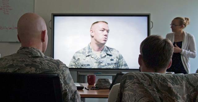Airmen from the 435th Contingency Response Squadron watch their videotaped interviews during a media training event Aug. 4 on Ramstein. The media training prepared Airmen for interviews with the press by making them aware of common nuances in areas such as body posture, speech volume and delivering the message of the U.S. Air Force mission.
