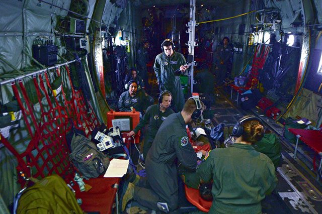 Airmen from the 86th Aeromedical Evacuation Squadron assess a mock patient during a training mission July 21 on Ramstein. There are currently four U.S. Air Force active-duty aeromedical evacuation squadrons, which make up 29 percent of the total aeromedical evacuation capability.