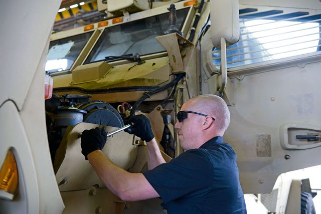 Senior Airman Duncan Wild, 86th Vehicle Readiness Squadron vehicle maintainer, conducts maintenance on a mine-resistant ambush protected vehicle July 13 on Ramstein. Airmen at the 86 VRS work on a wide variety of government-owned vehicles such as military vehicles, pickup trucks, police cars and special-purpose vehicles.