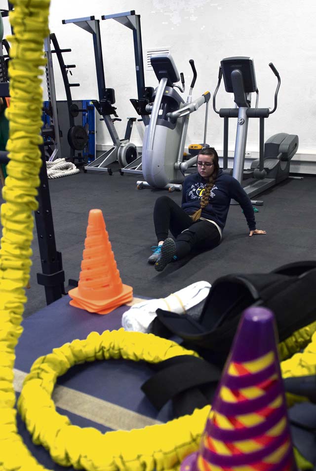 Senior Airman Larissa Greatwood, 86th Public Affairs photojournalist, performs leg raises during a knee rehabilitation class at Ramstein Air Base, Aug. 2, 2016. Patrons must receive a consult from an 86th Medical Operations Squadron physical therapist to attend a knee or back rehabilitation class. 