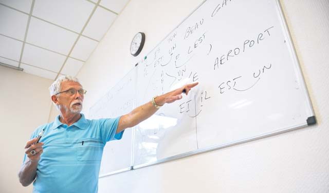 Robert Bels, French course instructor, recites the correct pronunciation of a word during a lesson Aug. 30 on Ramstein. Bels has been a French course instructor with the 86th Force Support Squadron for approximately five years.
