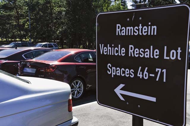 A sign points to parking spots at the 86th Force Support Squadron Outdoor Recreation resale lot Aug. 24 on Ramstein. The resale lot is located in the Northside Chapel parking lot, next to the Passenger Terminal long-term parking.