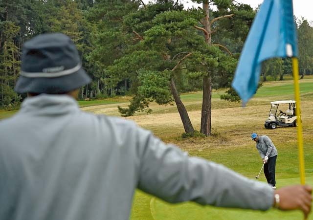 A participant hits a golf ball during the Army and Air Force Challenge Match golf tournament Sept. 18 at Rheinblick Golf Course in Wiesbaden, Germany.