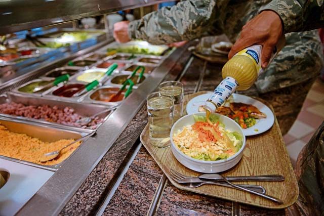 Customers help themselves to the salad bar at the Rheinland Inn dining facility Aug. 23 on Ramstein. Besides the salad bar, features of the DFAC include a hot-entree line, a deli, snack bar and a grill.