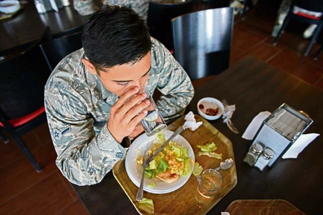 Airman Alfredo Piedrahita, 86th Munitions Squadron tactical air rapid response packages crew member, eats lunch at the Rheinland Inn Dining Facility Aug. 29 on Ramstein. Dormitory residents’ meals at the DFAC are paid for in advance. 
