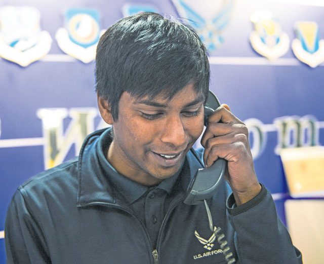 Victor Trey, 786th Force Support Squadron recreation assistant, answers a phone call Oct. 6 at the Southside Fitness Center on Ramstein. Airmen at Ramstein can call the SSFC to schedule physical training sessions, physical training tests or inquire about fitness classes.