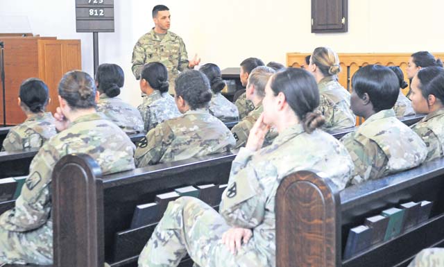 Female Soldiers with the 21st Theater Sustainment Command gather to learn more information about the new opportunity to join combat arms career specialties Oct. 13 at Daenner Kaserne Chapel.