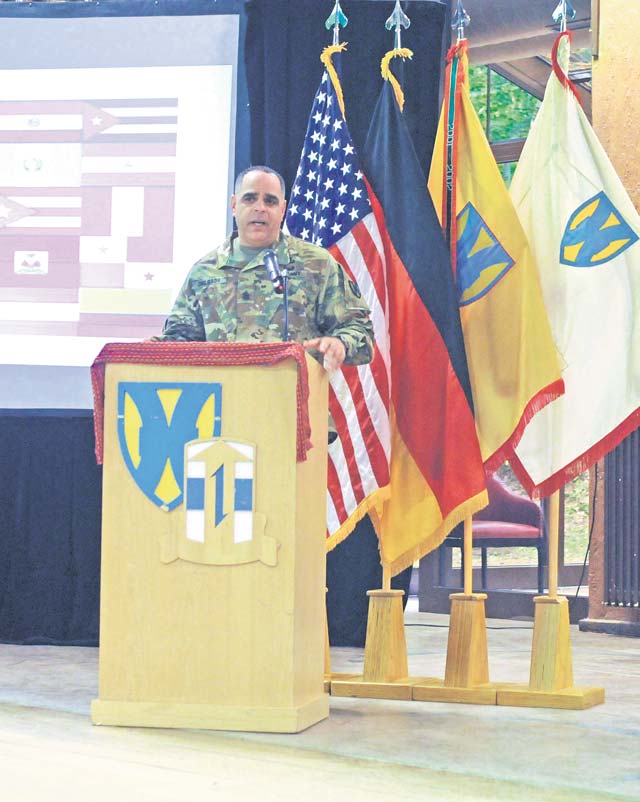 Command Sgt. Maj. Alberto Delgado, 21st Theater Sustainment Command senior enlisted leader, delivers remarks during the Hispanic Heritage Month celebration Oct. 14 at the Kazabra Club on Vogelweh. The annual monthlong observance ran from Sept. 15 to Oct.15.
