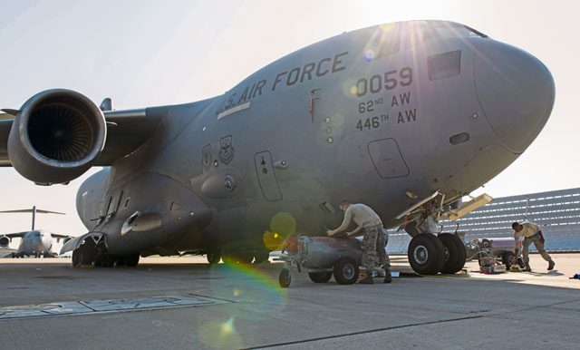 Airmen from the 721st Aircraft Maintenance Squadron service liquid oxygen for a C-17 Globemaster III Sept. 22 on Ramstein. This aircraft had almost depleted its liquid oxygen and required two pumps to refill it instead of the usual one.