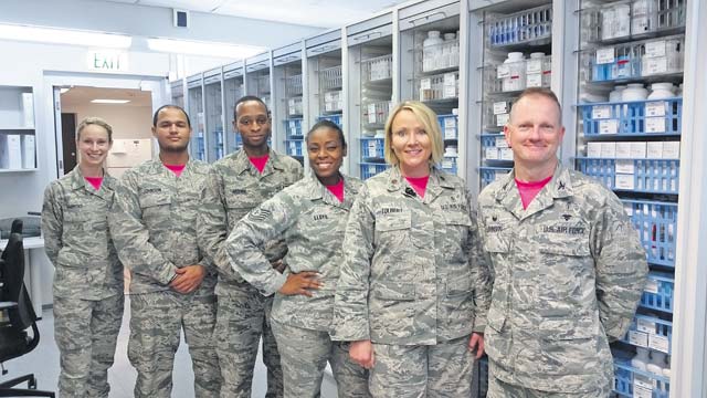 Courtesy photo Personnel of the 86th Medical Group pose for a photo in pink shirts to raise breast cancer awareness.