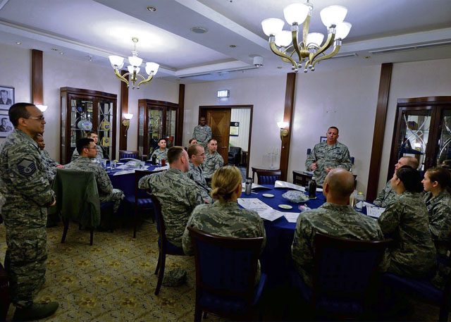 Senior noncommissioned officers and company grade officers share discussion topics during a mentoring luncheon Oct. 5 on Ramstein. The luncheon provided senior NCOs the opportunity to mentor company grade officers on enlisted career progression and enlisted performance reports.