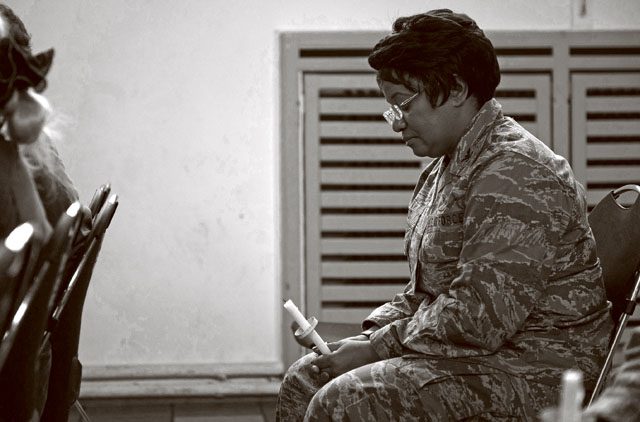Col. Donnette Boyd, 86th Airlift Wing chaplain, holds a moment of silence to remember the victims of interpersonal violence during a candlelight vigil Oct. 27 on Ramstein. The devastating physical, emotional and psychological consequences of interpersonal violence can cross generations and last lifetimes.