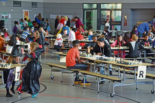 Photo by Melecio Figuracion Students dress up, play chess Kaiserslautern students play chess while dressed in costumes at a pre-Halloween chess tournament Oct. 29 at Kaiserslautern Elementary School. Over 70 students in costume participated in the round-robin, freaky-fun format. After the tournament, the six best costumes were awarded followed by a dance party with flashlights.