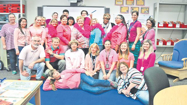 Staff at Smith Elementary School wear pink to celebrate Vickie Fergerson’s birthday and her fifth year cancer free Oct. 27 at SES in Baumholder.