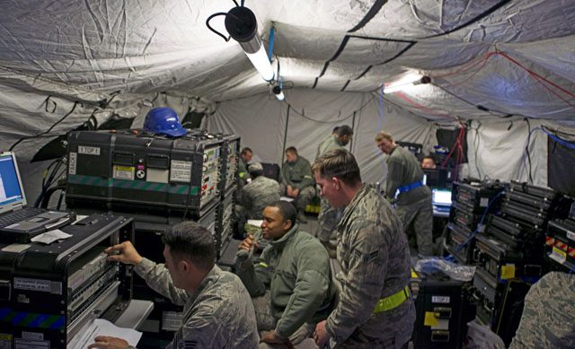 Airmen assigned to the 1st Combat Communications Squadron set up communications during exercise Healthy Thunder Oct. 27 on Ramstein. The squadron was broken into several teams during the exercise, each one playing its own role. The purpose of Healthy Thunder was to prepare the Airmen for a deployed situation.