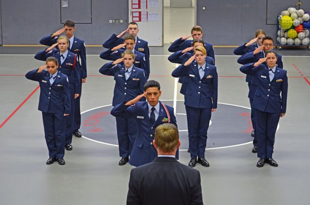 Wayne Barron, inspector, observes the Kaiserslautern High School second-year cadets demonstrate excellence through a drill demonstration during the Headquarters Air Force Junior ROTC evaluation Oct. 25 at KHS on Vogelweh. The Kaiserslautern High School cadets performed exceptionally well and took great pride in leading and accomplishing their unit briefing, drill demonstration and open ranks inspection. The junior ROTC instructors and cadets earned an overall unit assessment score of “Exceeds Standards,” the highest rating attainable, during the evaluation.