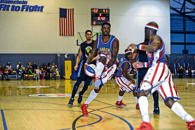 The Harlem Globetrotters play against the World All-Stars Nov. 10 on Ramstein. The event aimed to boost morale among U.S. troops and their families stationed in the KMC.