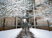 Senior Airman Collin Sams, 786th Force Support Squadron installation personnel readiness technician, walks outside his dormitory Jan. 10 on Ramstein. Sams was part of a bay orderly team in charge of maintaining cleanliness around dormitories across Ramstein, clearing walkways and parking lots of snow throughout the day as precipitation fell.