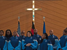 Members of the Vogelweh Gospel Choir prepare to sing at a Dr. Martin Luther King Jr. commemoration Jan. 13 on Ramstein. Dr. King grew further confidence in his public speaking ability through choir, something his mother encouraged him to do throughout his younger years.