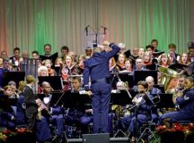 The U.S. Air Forces in Europe Band, along with German and American choirs, performs a Christmas concert Dec. 16 in Kaiserslautern. The event took place to continue to strengthen social bonds between the U.S. military community and local community.