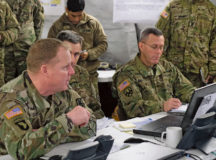 Maj. Gen. Duane A. Gamble, 21st Theater Sustainment Command commanding general (left), Col. Jeffrey Knight, 21st TSC chief of operations (center), and Brig. Gen. Steven W. Ainsworth, 7th Mission Support Command commanding general, listen during the 21st TSC commander’s update brief Jan. 7. Six Army Reserve Soldiers and two civilians from the 7th Mission Support Command are providing logistical and operational support to the 21st Theater Sustainment Command’s forward command post during reception, staging, onward movement and integration of the 4th Infantry Division’s 3rd Armored Brigade Combat Team as part of U.S. Army Europe’s operation Atlantic Resolve Jan. 3 to 23.